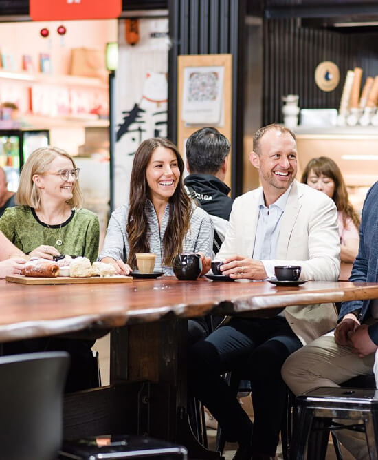 Burch & Co team members enjoying a coffee break together.